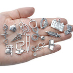 100g Crafts Supplies Antique Silver Medical Charms Alloy Hospital Charms Stethoscope Syringe Nurse Cap Hat Microscope Charm Pendants for Bracelet Necklace DIY Jewelry Making