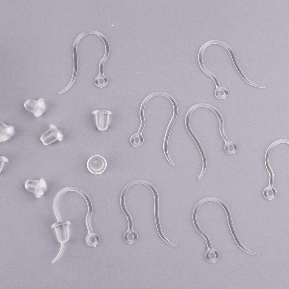 100pcs Clear Plastic Earring Hooks Ear Wire with Loop French Fish Hooks and 100pcs Transparent Earring Stoppers for DIY Earrings Jewelry Making Craft Decoration
