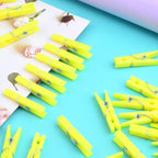 100 Pieces Mini Plastic Clothespins Sturdy Photo Paper Clips Decorative Craft Clips for Hanging Picture Arts Scrapbooking Home Wedding Decor, Yellow